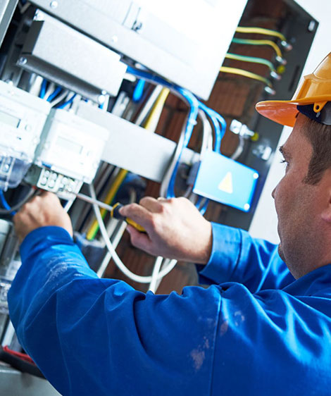 Electrician Working on a Switchboard — Sunny's Electrical In Townsville, QLD